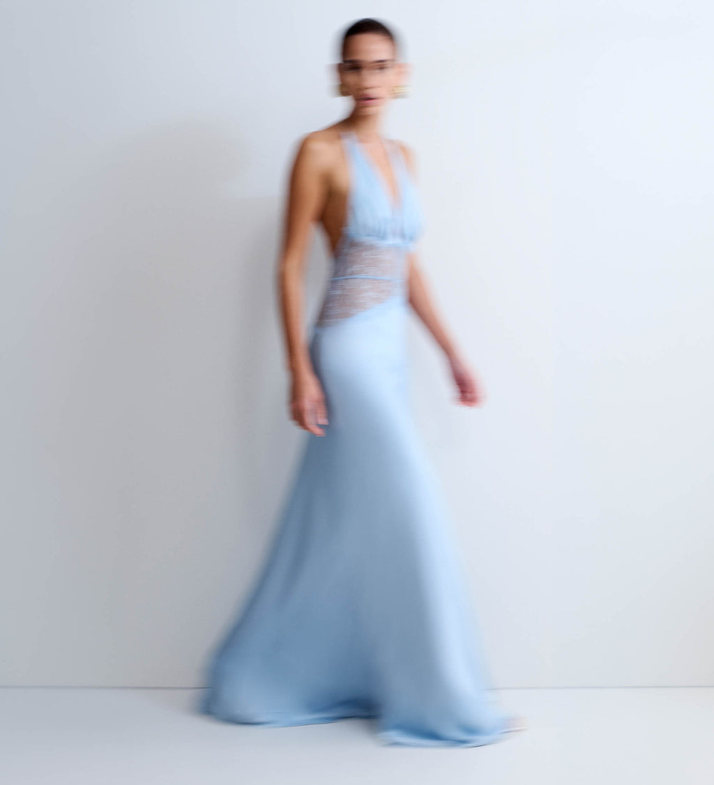 Woman in light blue maxi dress.