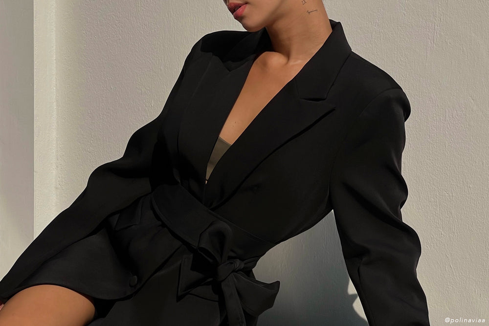 Image of black tailored suit jacket