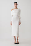Woman wearing a white modal one shoulder midi dress.