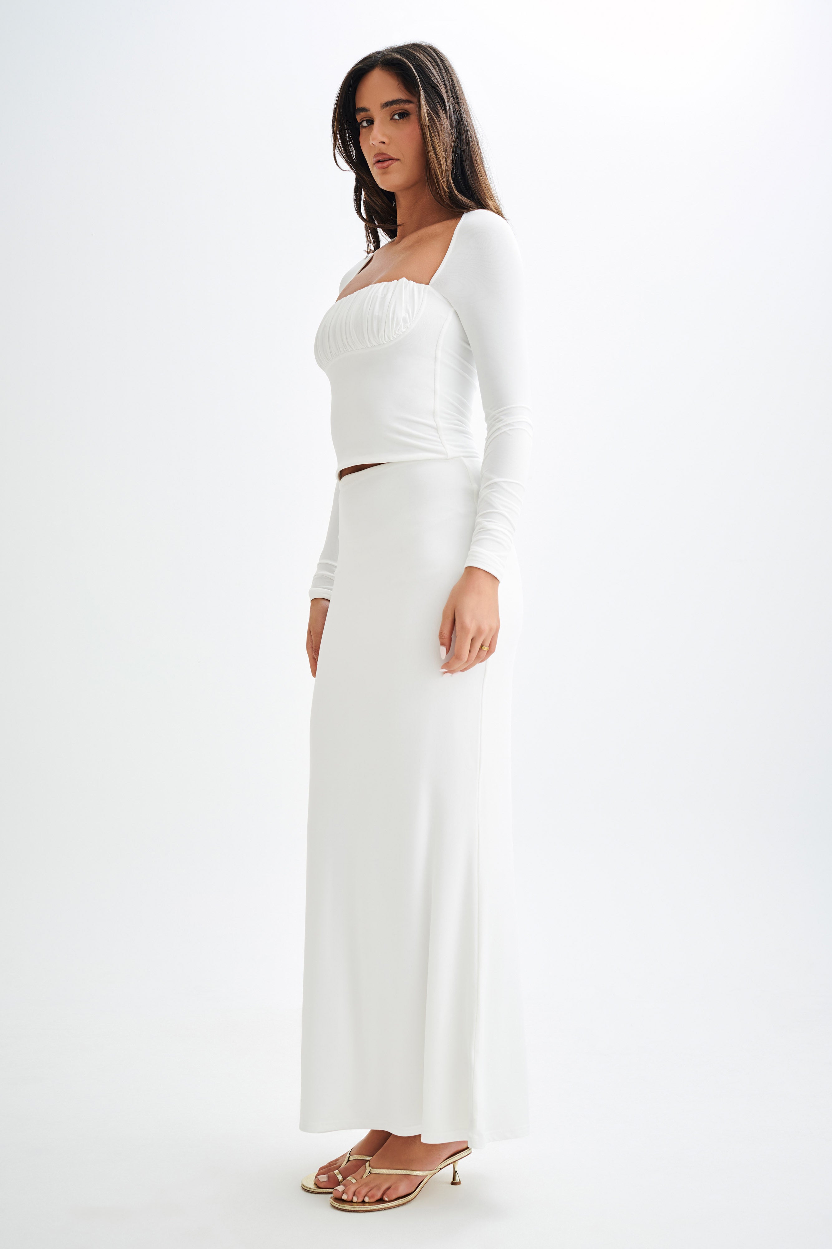white ruched long sleeve top