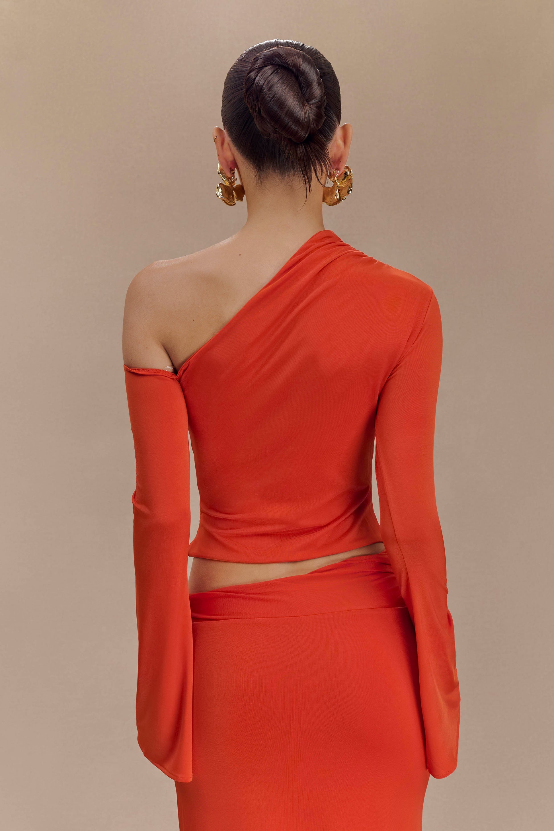 Ainsley Asymmetrical Long Sleeve Top With Floral Hardware / Burnt Orange | MESHKI | XS Ainsley Asymmetrical Long Sleeve Top With Floral Hardware / Burnt Orange | MESHKI | XS
