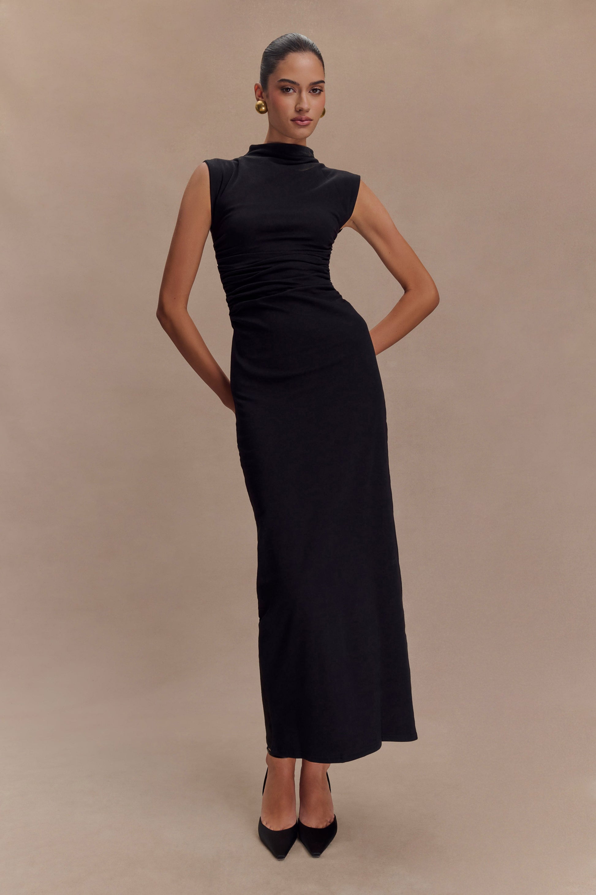 black form fitting dress RETENTION LONG-SLEEVED, FORM-FITTING WITH SEMI-SHEER TEXTURAL DETAILS M Features * Convertible neckline wear on or off the shoulder * Sheer long sleeves for elegant arm coverage * Allover ruching flatters and defines curves * Bodycon mini length for a leglengthening effect * Back zipper * Fully lined body Oxford Black - Form Fitting