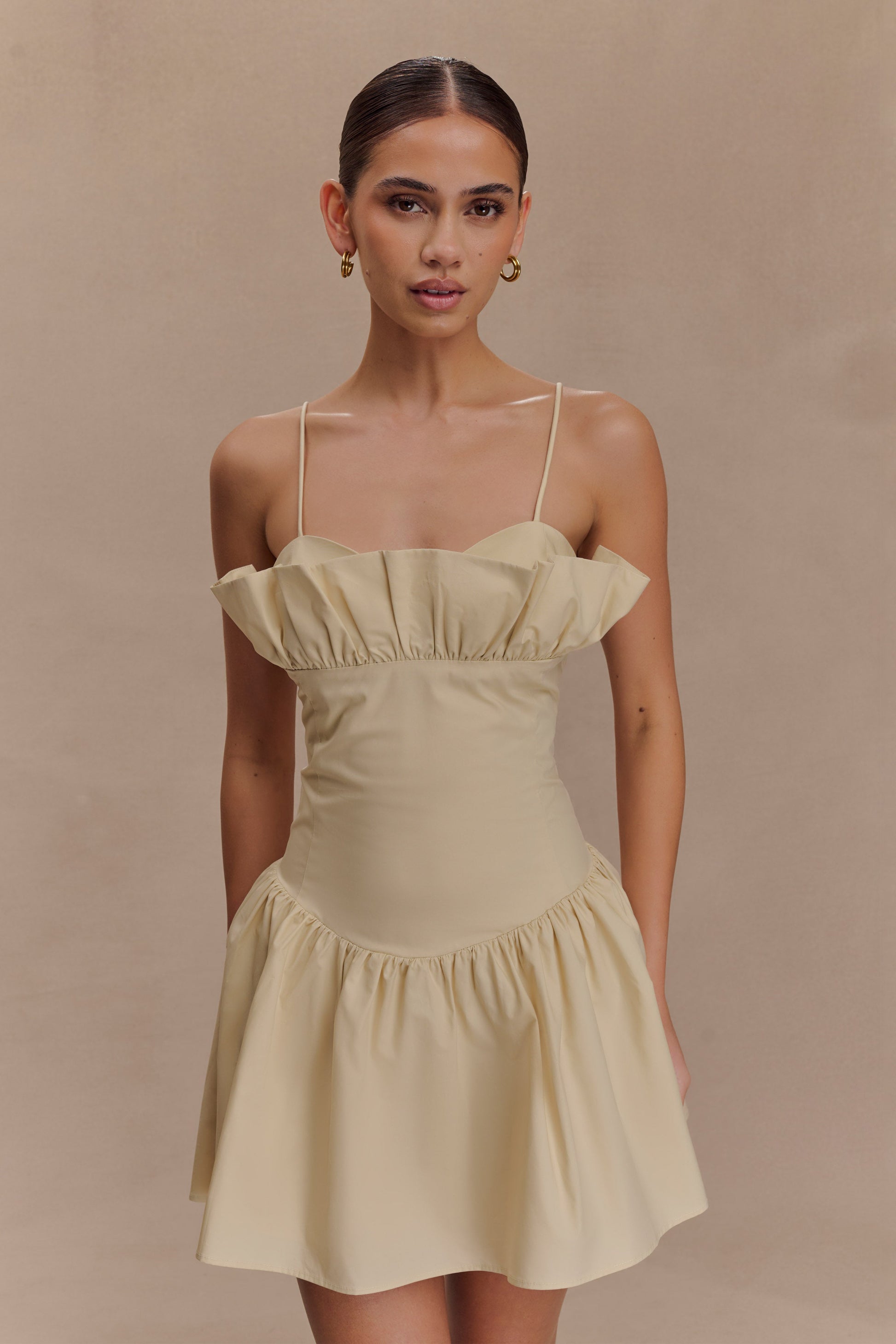 nude mini dress Contrast Hem Sleeveless Amanda Jean NYC Exude sophistication with a touch of allure in our Mollie mini Barely Nude Mini Dress
