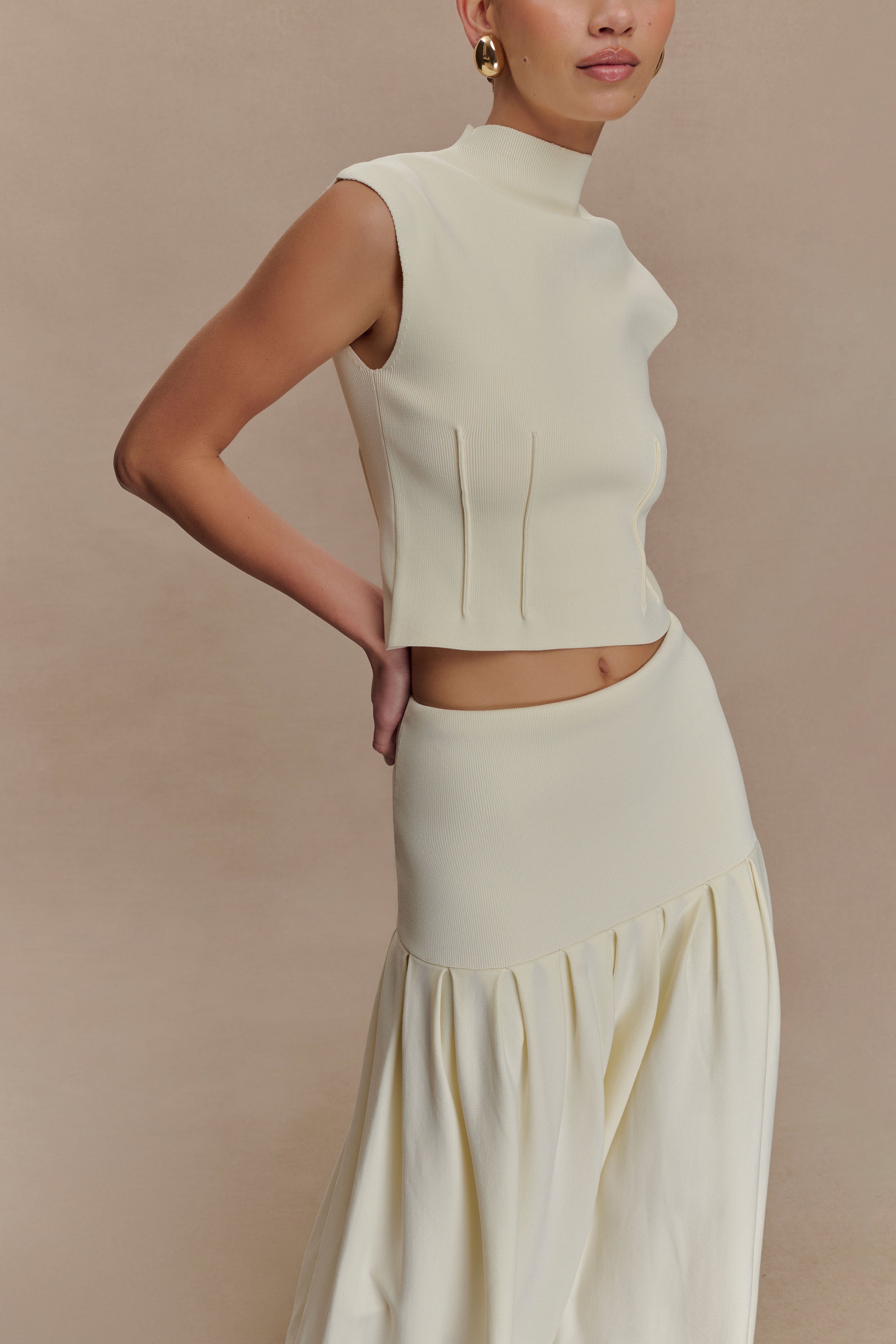 トップス euw rattan design knit bustier set ivory Romaine High Neck Bandage Knit Top - Ivory | MESHKI US