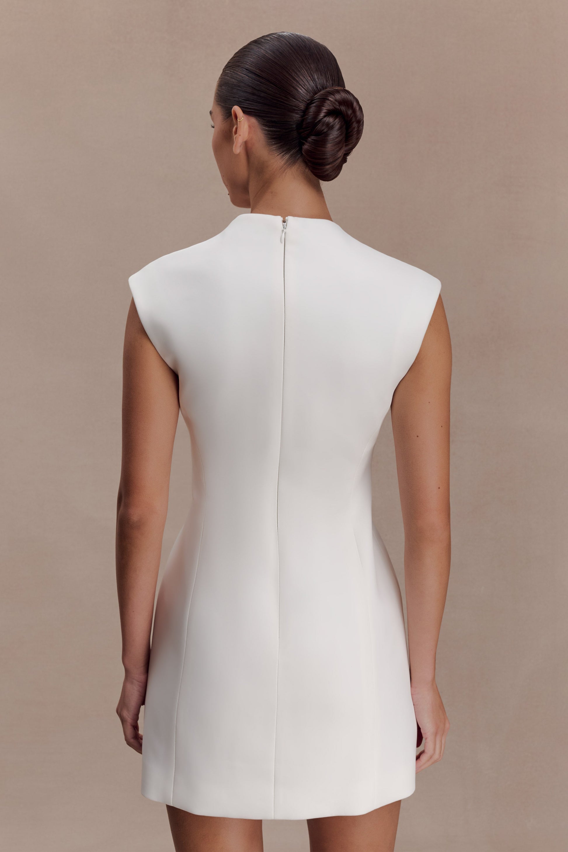 cut-out hardware detail mini dress in buttercream Wyetta Cut-Out Hardware Detail Mini Dress in Buttercream