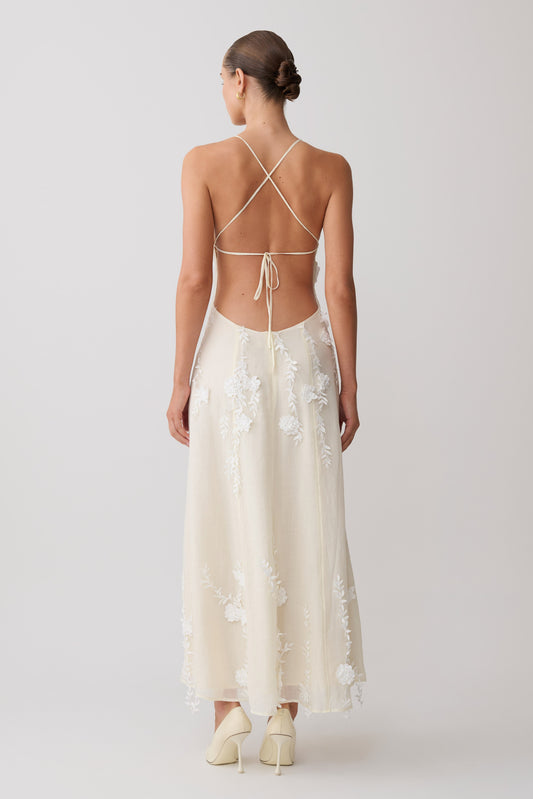 meshki white dresses Yvette Slip Maxi Dress With Asymmetrical Hem - the straight skirt flows into a maxi length for a timeless White Midi Dresses - Shop