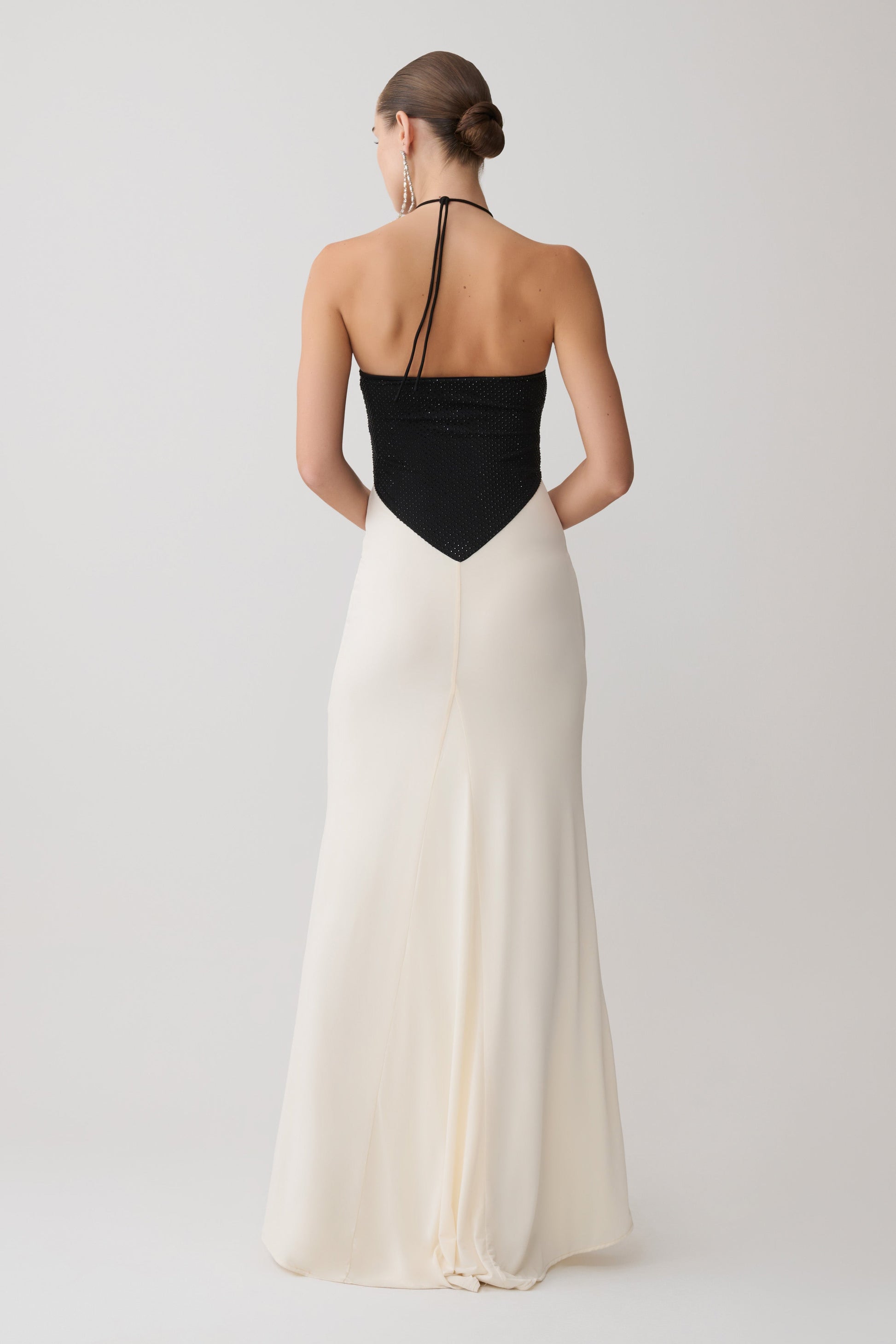 black and white halter wedding dress The ultimate minimal -chic bridal dress with halter neck and detachable cape In store Exclusively for our precious brides to be