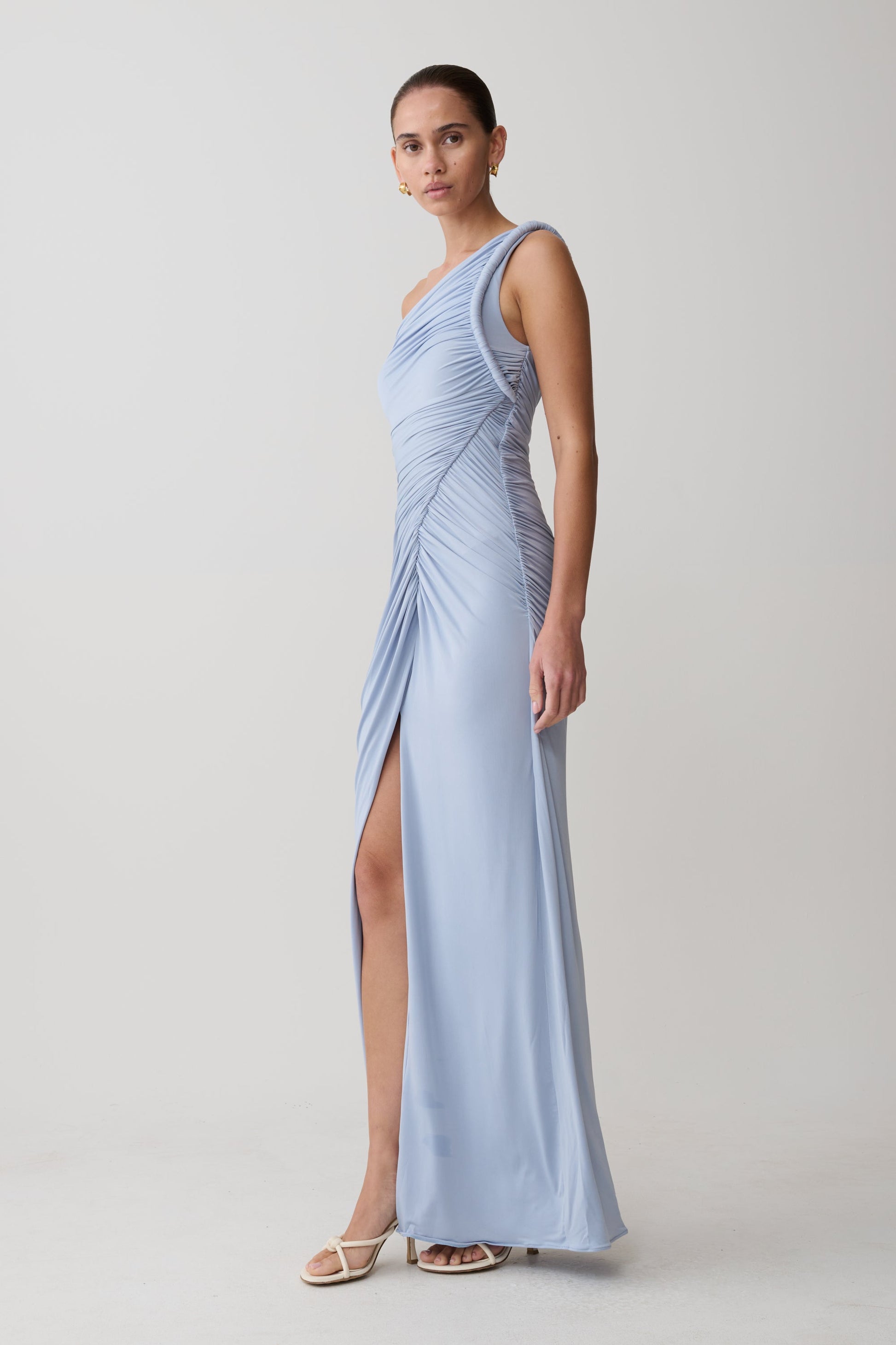 twisted one shoulder dress ARRANGE one shoulder draped twist detail maxi dress with metal trim detail in buttermilk