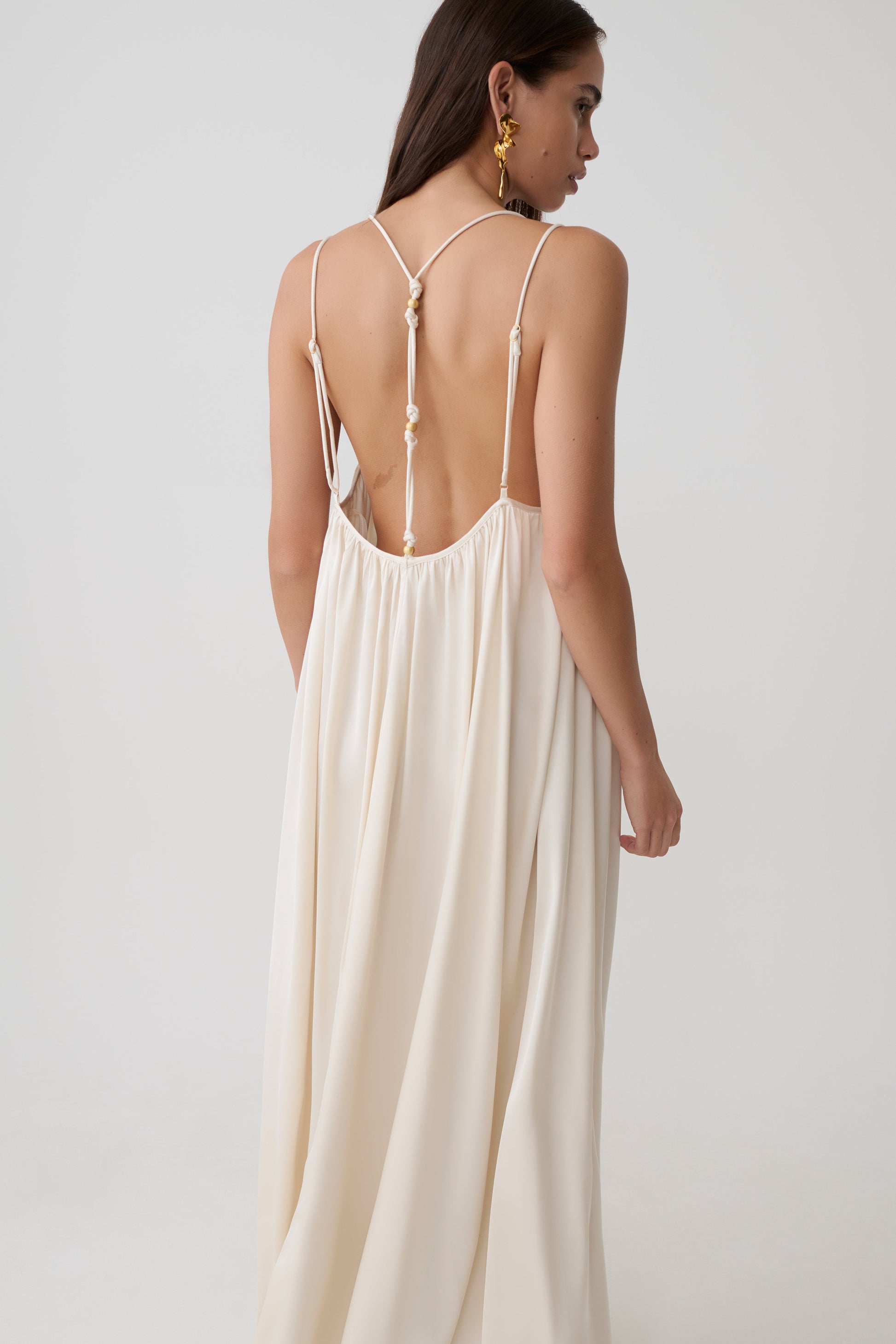buttercream maxi dress Adriana Satin Gathered Maxi Dress / Buttercream | MESHKI