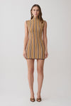 Woman wearing a brown and orange striped sleeveless mini dress.