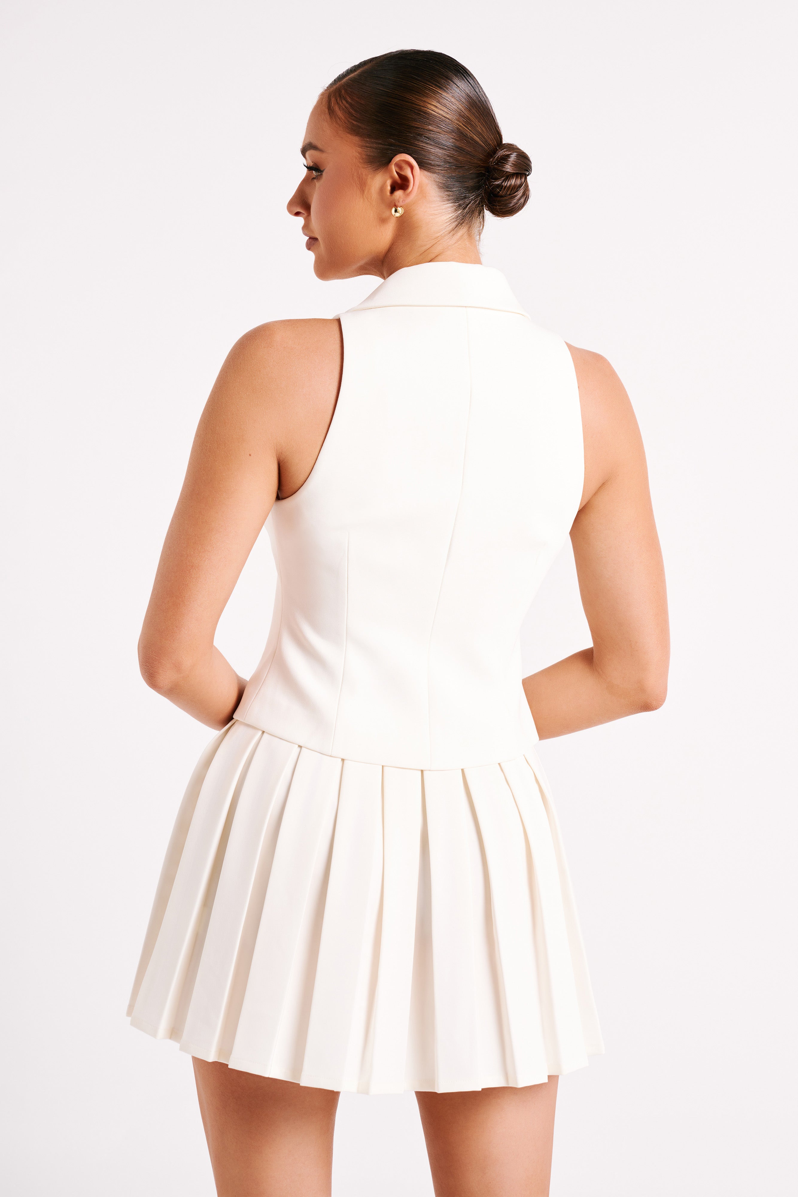 Mura Pleated Mini Skirt - Ivory | MESHKI US