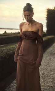 Image of woman in chocolate dress.