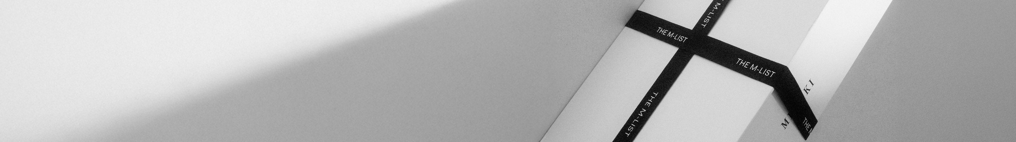 White box with black 'The M-List' branding on a white background.